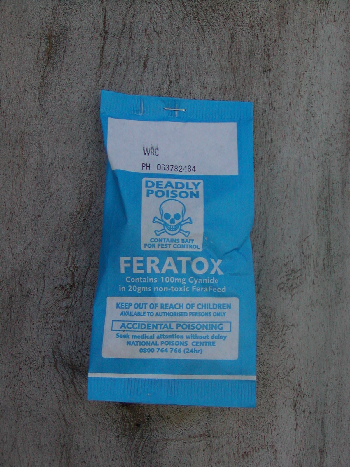 Feratox bait bag; it is light blue and labelled 'Feratox', and also has the words 'deadly poison' and a skull icon