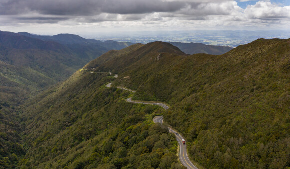 A road winds through the hills in the Wairarapa landscape