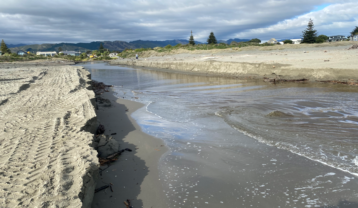 The newly-cut Waimeha Stream flowing to the ocean